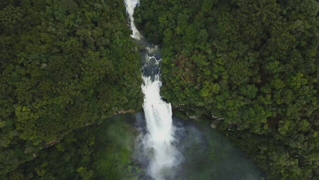 Beautiful Waterfall among Lush Dense Greenery. Aerial View
