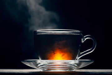 One cup of hot black tea on a dark background, hot tea, studio photo