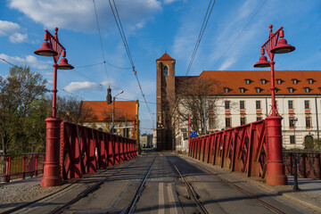 Bridge with lanterns on urban street in Wroclaw
