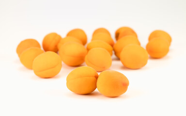 Apricot fruit isolated on bright background. Selective focus.