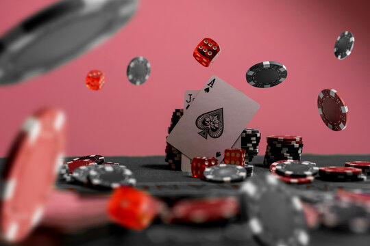 The concept of chips and cards for playing poker on the background of a flying cards
