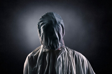 Fototapeta na wymiar Portrait of a scary ghost over dark misty background