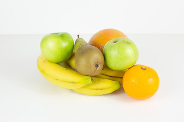 exotic fruits on white surface