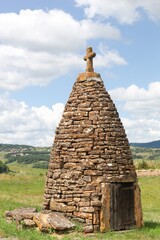 Sarrasine water well with a religious cross in Ville sur Jarnioux, Beaujolais, France