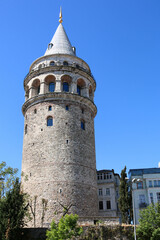 Fototapeta na wymiar Galata Tower, medieval stone tower in Istanbul, Turkey, in the foreground on a sunny day