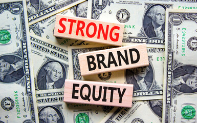 Strong brand equity symbol. Concept words Strong brand equity on wooden blocks on a beautiful...