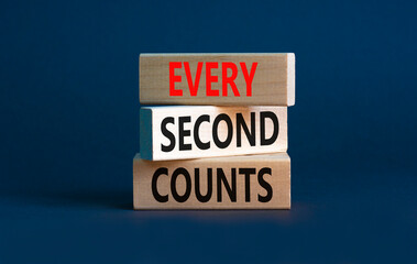 Every second counts symbol. Concept words Every second counts on wooden blocks on a beautiful grey table grey background. Business, motivational and every second counts concept. Copy space.