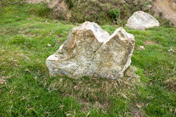Nine Maidens stone row Cornwall all the stones are of quartz the north-eastern stone is prostrate and broken it measures 15 feet in length the tallest of those still standing is 6 feet 7 inches high 