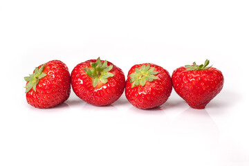 fresh organic strawberries isolated on white background