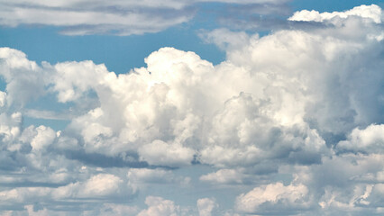 White porous clouds on blue sky, sky with clouds, cloudy landscape