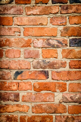Old red brick wall background.