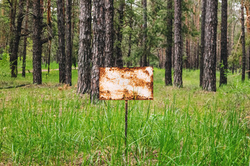 Warning sign in the forest.