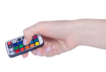 Fototapeta premium LED strip remote control in hand on white background isolation