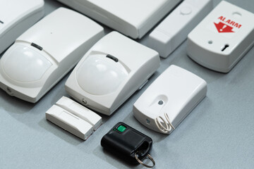 Fototapeta premium set of security systems for the house on a gray background close-up