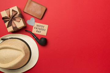 Happy Father's Day inscription with different gifts on color background, top view