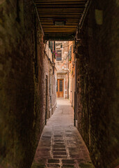 narrow street alley in Venice, Italy 