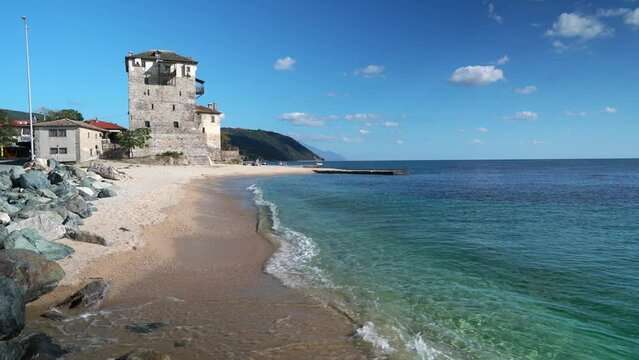 Byzantine Tower of Prosphorion in Ouranoupoli, Beautiful Beach in Greece.