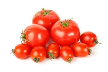 Fresh organic tomatoes on a white background, ripe vegetables.