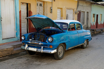 old classic cars in the streets of trinidad