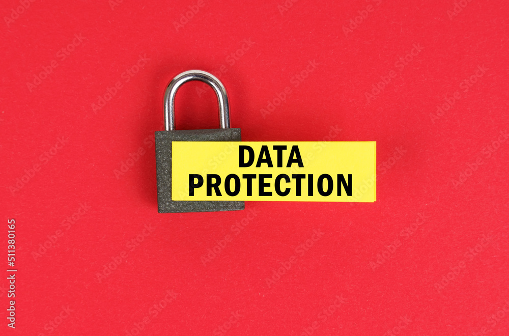 Poster On the red surface there is a lock with a sticker with the inscription - Data protection