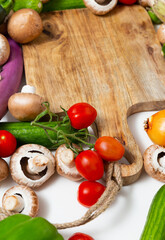Fresh vegetables on the kitchen board. Background idea.