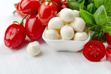 Mozzarella cheese with basil and tomatoes.