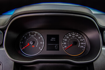 Car speedometer close-up. Car instrument panel