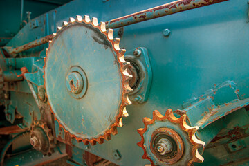 Gears of the agricultural machine mechanism close-up