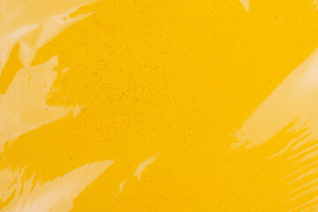 Bright colored transparent gift box. Glitter paper under cellophane. Background with copy space or backdrop for design