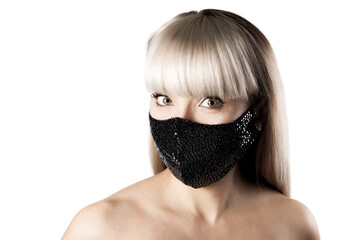 Beautiful brunette girl with blond hair fringe bangs wearing black fashionable protective face mask..