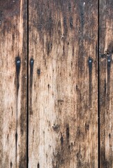 Picture of textured hardwood no people picture as a design of perfect simplicity of a death material with structure element and black worn wholes, ugly dirty cracked rustic surface as background.