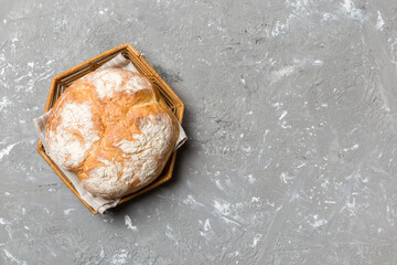 Freshly baked bread on basket against natural background. top view bread copy space