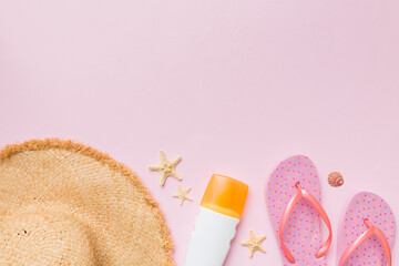 Summer vacation concept flat lay. straw hat beach accessories and towel top view. Space for text. travel concept