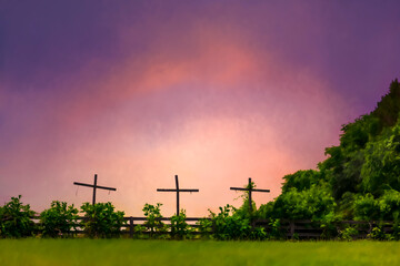 Digital painting of three wooden crosses on a hill with a wooden fence, trees, green grass and purple sunset.