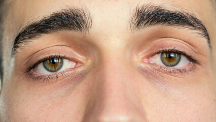 Closeup of a man staring directly at the camera	