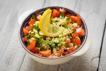 Lebanese tabbouleh salad with bulgur, parsley, tomato and cucmber
