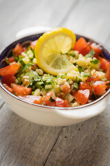 Lebanese tabbouleh salad with bulgur, parsley, tomato and cucmber