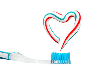 the heart symbol is made from a three-color toothpaste and is located above the toothbrush