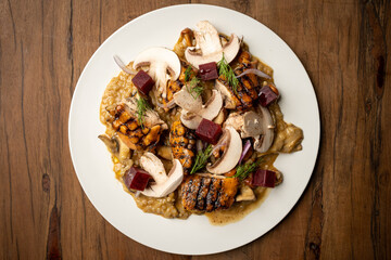 risotto with grilled duck, mushrooms, onion and beet cubes