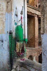 Small altar among the ruins of the British residence. Lucknow, Uttar Pradesh. India.