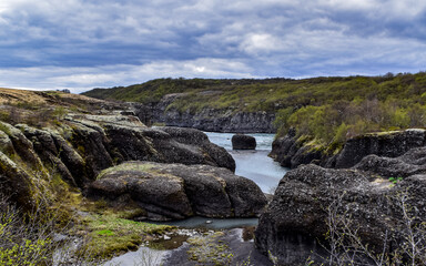 Fototapeta premium Beautiful waterfall in Iceland. Typical Iceland landscape, wild nature 
