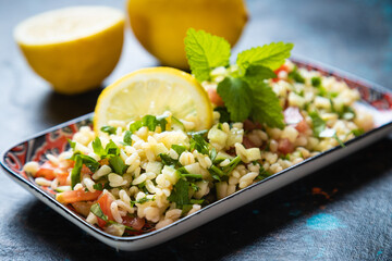 Lebanese tabbouleh salad with bulgur, parsley, tomato and cucmber