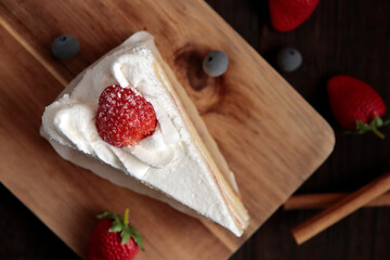 Christmas and birthday shortcakes on the table