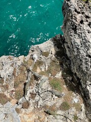 Huge rocks in the sea from above