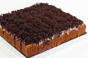 Small Square Sponge Cakes Cake Potong with Chocolate Shredded Dark Cooking Chocolate and Cream