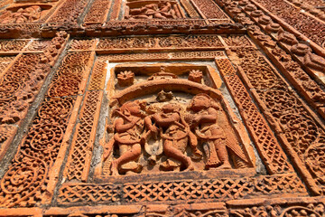 Famous terracotta (fired clay of a brownish-red colour, used as ornamental building material) relief artworks at Madanmohan Temple, Bishnupur, West Bengal, India. UNESCO heritage site of India.