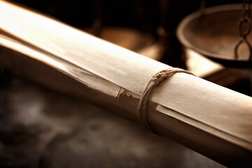 Old scroll with medieval style background. Shallow depth of field.