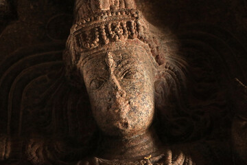Indian assertive divinity lord shiva with third eye sculpted in the pillar