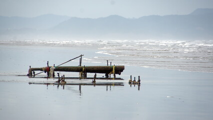 Sewer pipe discharging on the beach in Canoa, Ecuador