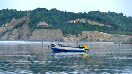 Fishing boat on the beach in Canoa, Ecuador